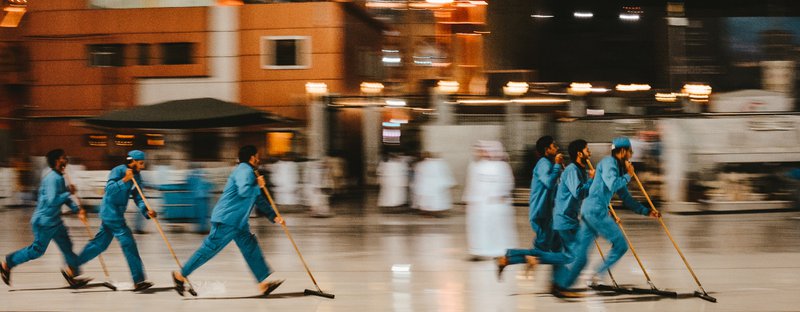 The Masjidi al-Haram (Kaaba) complex in Mecca is always busy with pilgrims during the hajj season. Keeping things tidy and organised thus becomes a challenge. Thankfully the  staff are working round the clock! The are also efficient and have a unique way of doing things to ensure that the facility is comfortable for all. For this photo, I tried to capture the  team work and the fast motion of running & mopping.