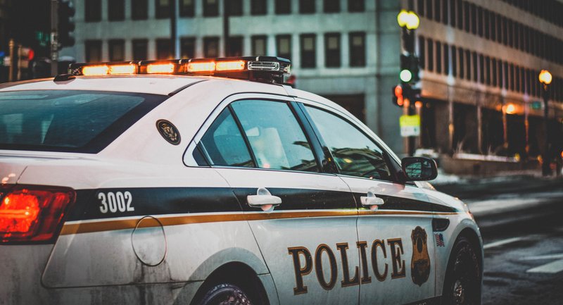 White police car patrolling