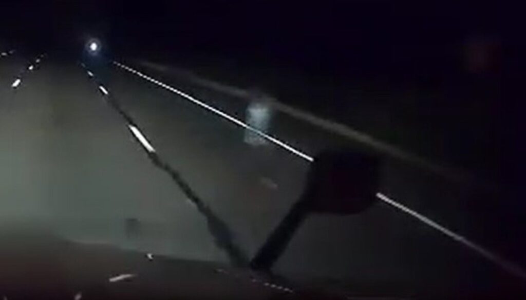 A Truck driver's dashcam catches a ghost on Highway 87, sparking a frenzy in paranormal interest; cover